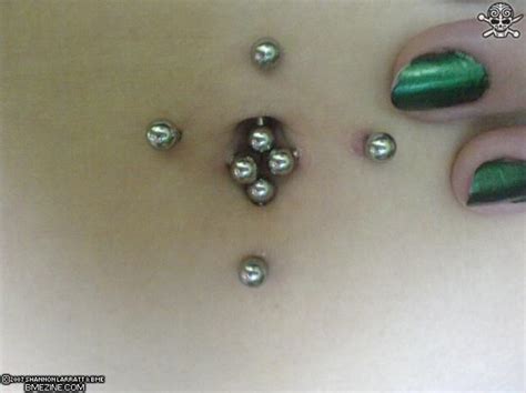 multiple belly button piercings|belly button piercing on bottom.